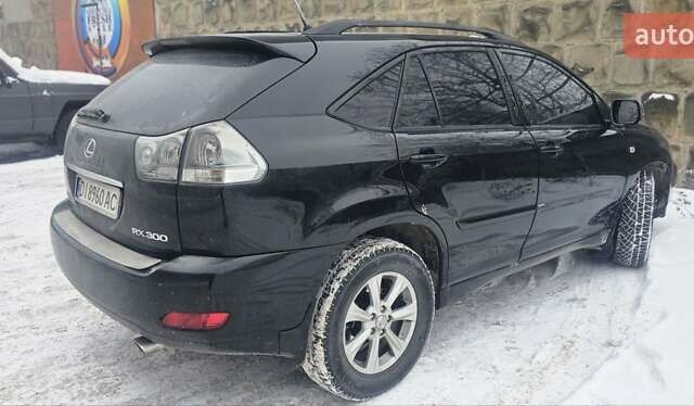 Черный Лексус РХ, объемом двигателя 3 л и пробегом 248 тыс. км за 10000 $, фото 1 на Automoto.ua