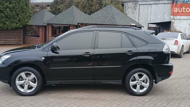 Черный Лексус РХ, объемом двигателя 3.31 л и пробегом 296 тыс. км за 8900 $, фото 1 на Automoto.ua