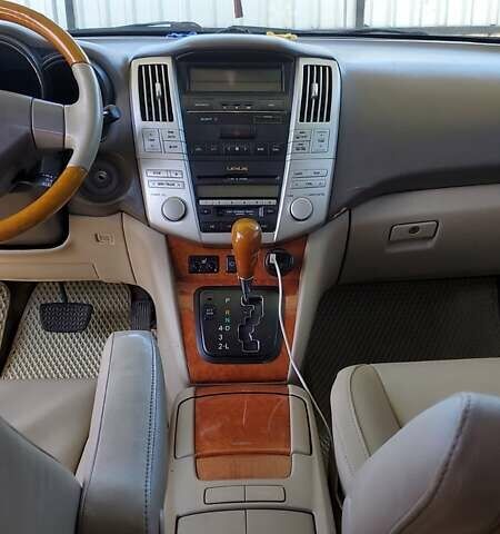 Черный Лексус РХ, объемом двигателя 3.3 л и пробегом 280 тыс. км за 8200 $, фото 2 на Automoto.ua