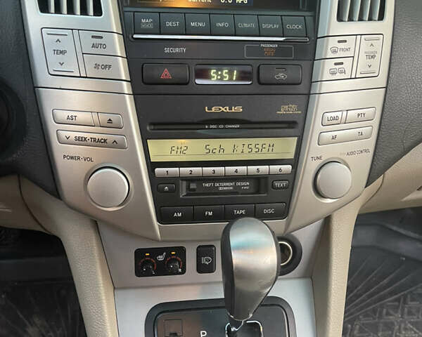 Черный Лексус РХ, объемом двигателя 3.31 л и пробегом 235 тыс. км за 10200 $, фото 1 на Automoto.ua
