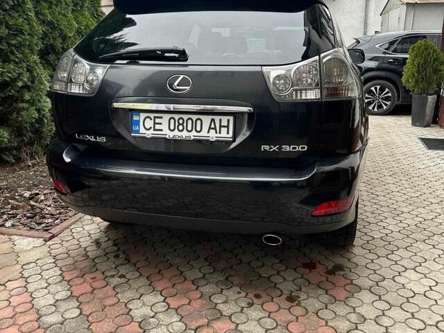 Чорний Лексус РХ, об'ємом двигуна 3 л та пробігом 220 тис. км за 7500 $, фото 1 на Automoto.ua