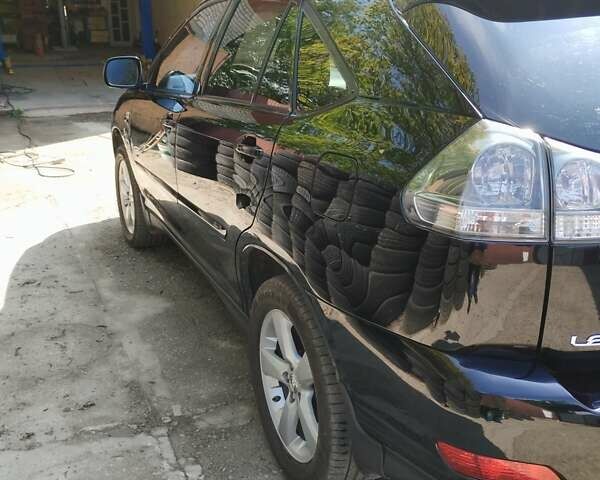 Чорний Лексус РХ, об'ємом двигуна 3 л та пробігом 242 тис. км за 9500 $, фото 100 на Automoto.ua