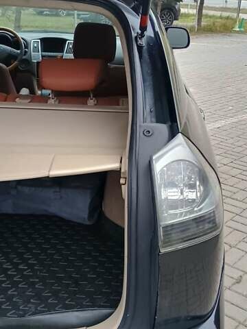 Черный Лексус РХ, объемом двигателя 3.31 л и пробегом 296 тыс. км за 8900 $, фото 61 на Automoto.ua