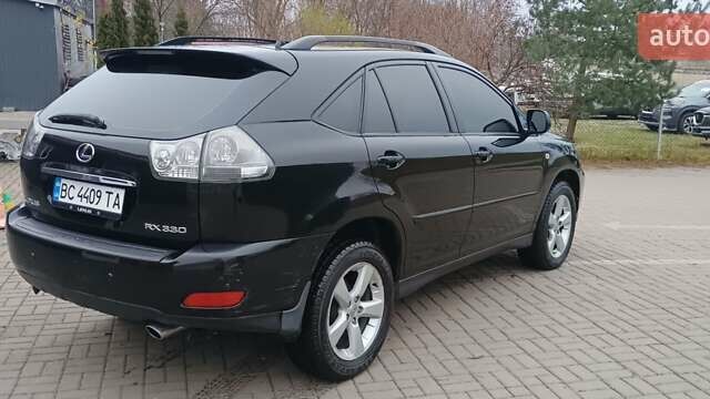 Черный Лексус РХ, объемом двигателя 3.31 л и пробегом 296 тыс. км за 8900 $, фото 4 на Automoto.ua