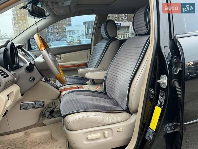 Черный Лексус РХ, объемом двигателя 3 л и пробегом 330 тыс. км за 8990 $, фото 11 на Automoto.ua