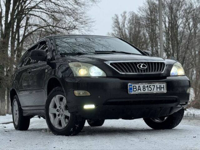 Черный Лексус РХ, объемом двигателя 2.4 л и пробегом 287 тыс. км за 6350 $, фото 2 на Automoto.ua