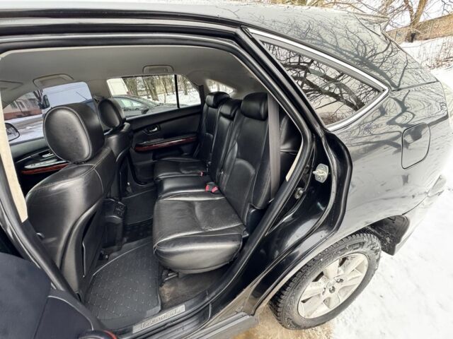 Черный Лексус РХ, объемом двигателя 2.4 л и пробегом 287 тыс. км за 6350 $, фото 9 на Automoto.ua