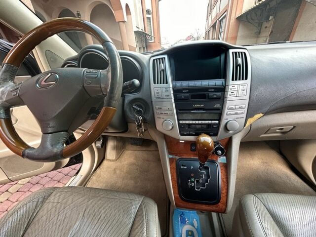 Черный Лексус РХ, объемом двигателя 3.3 л и пробегом 290 тыс. км за 10424 $, фото 3 на Automoto.ua