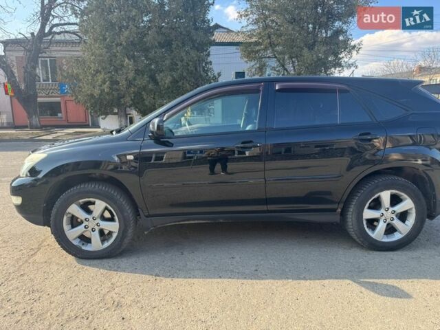 Черный Лексус РХ, объемом двигателя 3.31 л и пробегом 304 тыс. км за 7500 $, фото 3 на Automoto.ua