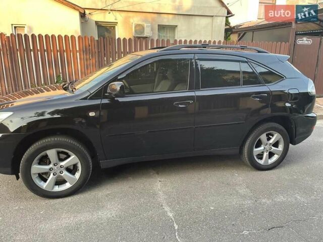 Черный Лексус РХ, объемом двигателя 3.31 л и пробегом 282 тыс. км за 10000 $, фото 1 на Automoto.ua