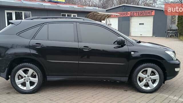 Черный Лексус РХ, объемом двигателя 3.31 л и пробегом 296 тыс. км за 8900 $, фото 5 на Automoto.ua