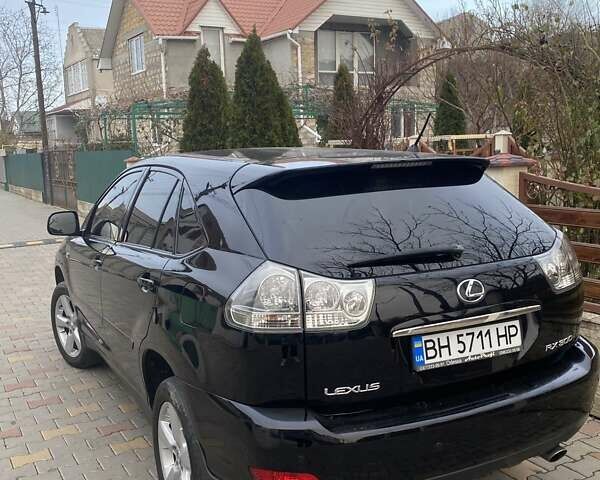 Черный Лексус РХ, объемом двигателя 3 л и пробегом 196 тыс. км за 9700 $, фото 2 на Automoto.ua