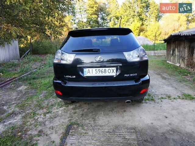 Черный Лексус РХ, объемом двигателя 3 л и пробегом 325 тыс. км за 8500 $, фото 2 на Automoto.ua