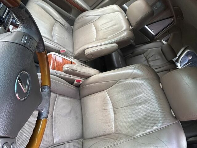 Черный Лексус РХ, объемом двигателя 3.3 л и пробегом 290 тыс. км за 10424 $, фото 1 на Automoto.ua