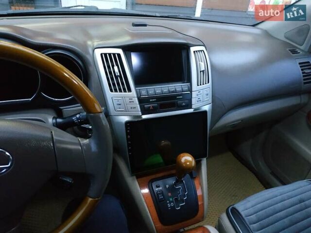 Черный Лексус РХ, объемом двигателя 3 л и пробегом 325 тыс. км за 8500 $, фото 4 на Automoto.ua