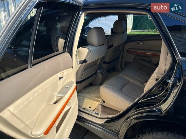 Черный Лексус РХ, объемом двигателя 3.3 л и пробегом 230 тыс. км за 10000 $, фото 7 на Automoto.ua