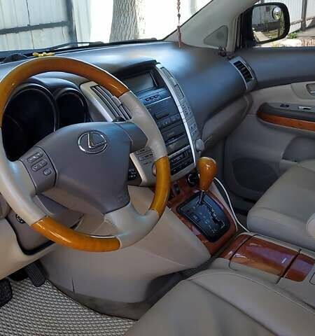 Черный Лексус РХ, объемом двигателя 3.3 л и пробегом 280 тыс. км за 8200 $, фото 3 на Automoto.ua