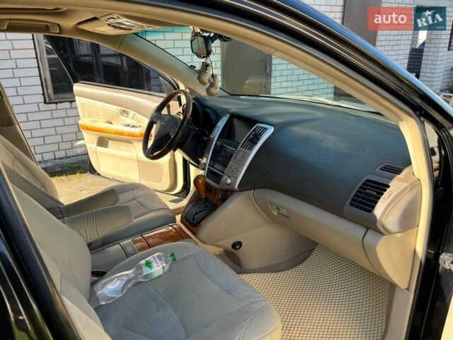 Черный Лексус РХ, объемом двигателя 3.3 л и пробегом 230 тыс. км за 10000 $, фото 12 на Automoto.ua