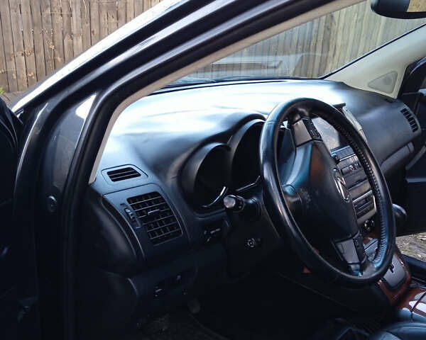 Чорний Лексус РХ, об'ємом двигуна 3 л та пробігом 317 тис. км за 9100 $, фото 4 на Automoto.ua