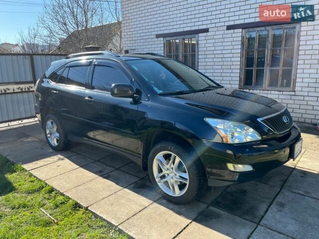 Черный Лексус РХ, объемом двигателя 3.3 л и пробегом 230 тыс. км за 10000 $, фото 2 на Automoto.ua
