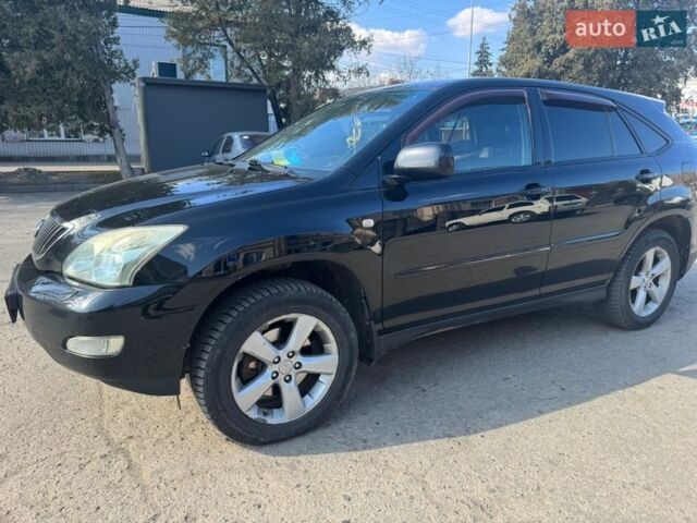 Черный Лексус РХ, объемом двигателя 3.31 л и пробегом 304 тыс. км за 7500 $, фото 2 на Automoto.ua