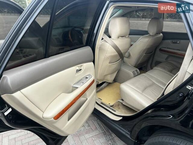 Черный Лексус РХ, объемом двигателя 3.3 л и пробегом 279 тыс. км за 9700 $, фото 2 на Automoto.ua