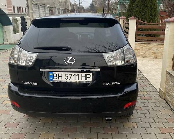Черный Лексус РХ, объемом двигателя 3 л и пробегом 196 тыс. км за 9700 $, фото 1 на Automoto.ua