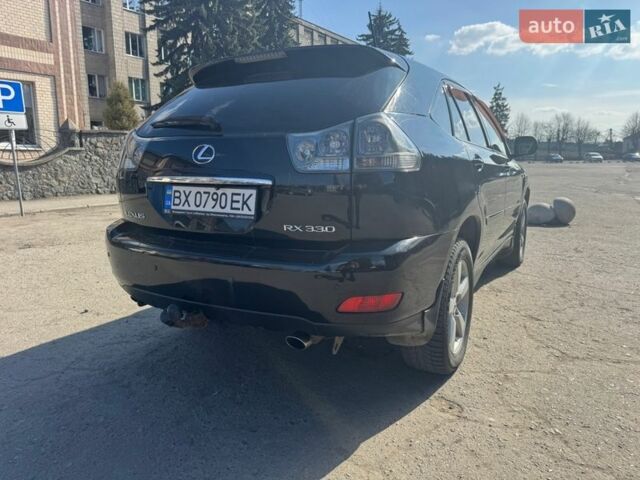 Черный Лексус РХ, объемом двигателя 3.31 л и пробегом 304 тыс. км за 7500 $, фото 7 на Automoto.ua