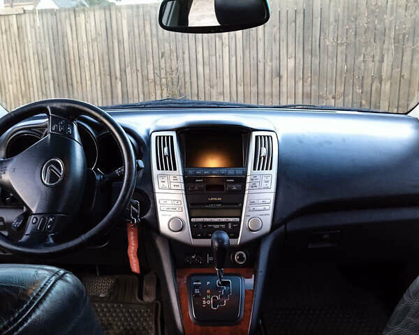 Чорний Лексус РХ, об'ємом двигуна 3 л та пробігом 317 тис. км за 9100 $, фото 5 на Automoto.ua