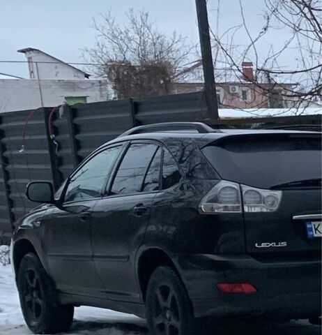 Черный Лексус РХ, объемом двигателя 3.3 л и пробегом 260 тыс. км за 10800 $, фото 1 на Automoto.ua