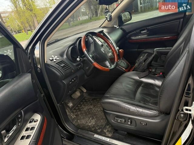Черный Лексус РХ, объемом двигателя 3.5 л и пробегом 183 тыс. км за 11200 $, фото 19 на Automoto.ua