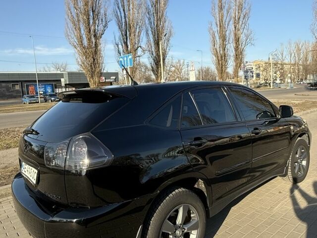 Черный Лексус РХ, объемом двигателя 3.5 л и пробегом 295 тыс. км за 11500 $, фото 2 на Automoto.ua