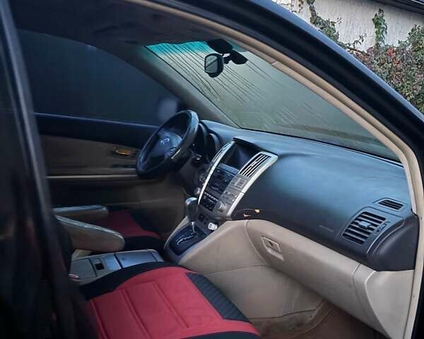 Черный Лексус РХ, объемом двигателя 3.3 л и пробегом 220 тыс. км за 10000 $, фото 4 на Automoto.ua