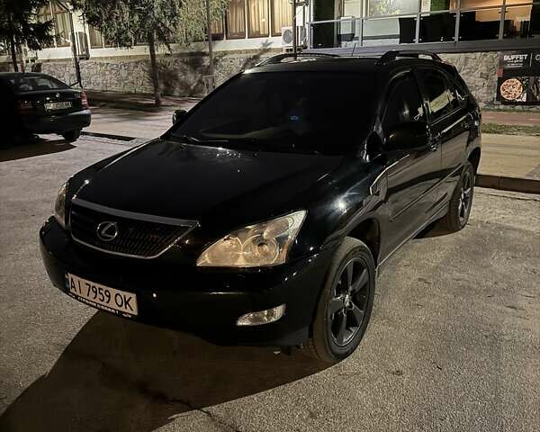 Черный Лексус РХ, объемом двигателя 3.5 л и пробегом 270 тыс. км за 10000 $, фото 4 на Automoto.ua
