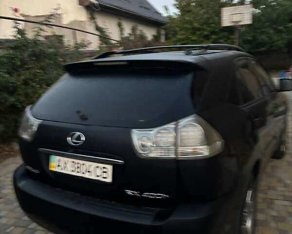 Черный Лексус РХ, объемом двигателя 3.3 л и пробегом 220 тыс. км за 10000 $, фото 2 на Automoto.ua