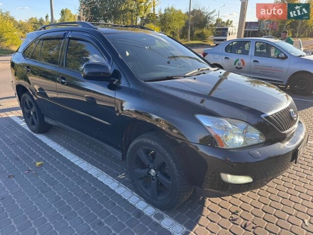 Черный Лексус РХ, объемом двигателя 3.46 л и пробегом 300 тыс. км за 8800 $, фото 1 на Automoto.ua