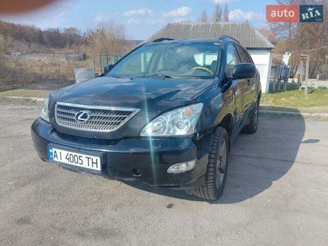 Черный Лексус РХ, объемом двигателя 3 л и пробегом 265 тыс. км за 6100 $, фото 1 на Automoto.ua