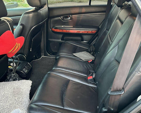 Черный Лексус РХ, объемом двигателя 3.5 л и пробегом 260 тыс. км за 13999 $, фото 9 на Automoto.ua