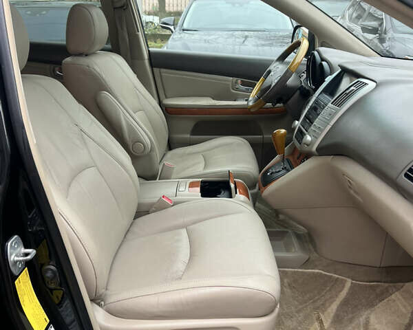 Черный Лексус РХ, объемом двигателя 3.46 л и пробегом 220 тыс. км за 11500 $, фото 24 на Automoto.ua