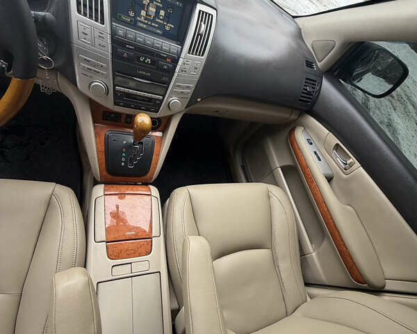 Черный Лексус РХ, объемом двигателя 3.31 л и пробегом 290 тыс. км за 8900 $, фото 41 на Automoto.ua