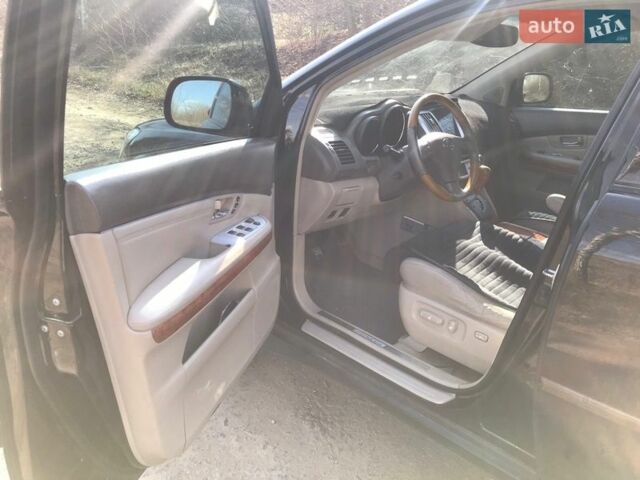 Черный Лексус РХ, объемом двигателя 3.46 л и пробегом 330 тыс. км за 9000 $, фото 7 на Automoto.ua