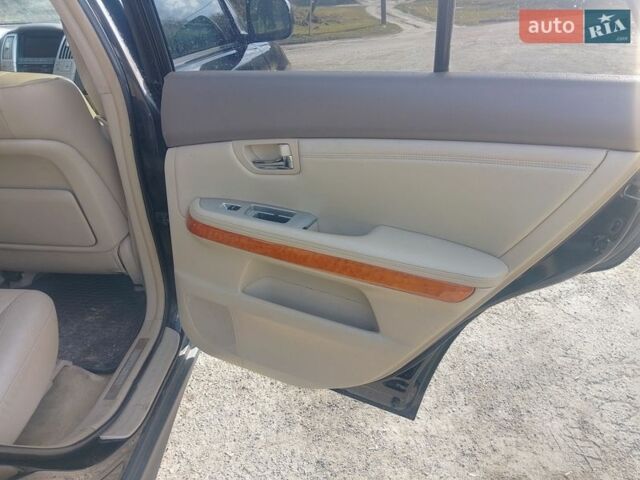 Черный Лексус РХ, объемом двигателя 3 л и пробегом 265 тыс. км за 6100 $, фото 36 на Automoto.ua