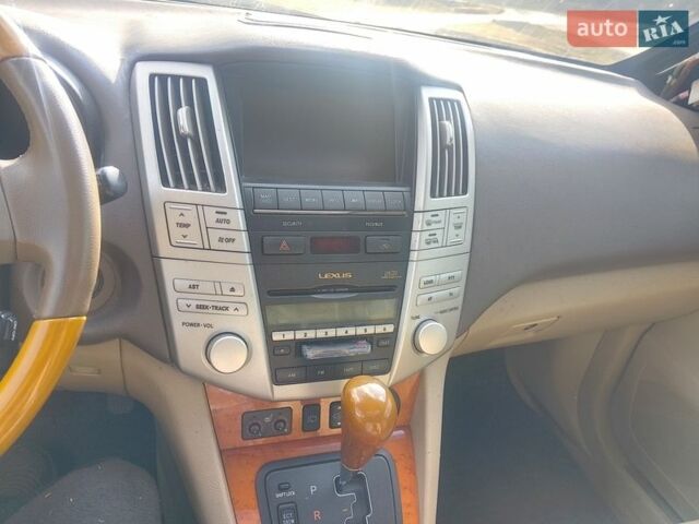 Черный Лексус РХ, объемом двигателя 3 л и пробегом 265 тыс. км за 6100 $, фото 24 на Automoto.ua