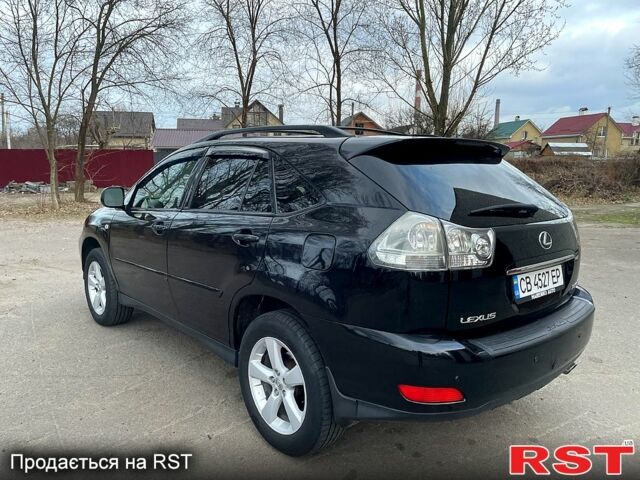 Черный Лексус РХ, объемом двигателя 3.5 л и пробегом 250 тыс. км за 9800 $, фото 2 на Automoto.ua