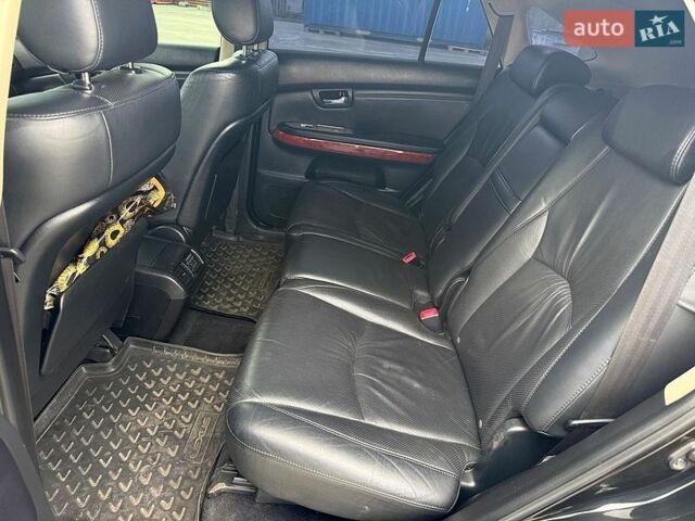 Черный Лексус РХ, объемом двигателя 3.5 л и пробегом 183 тыс. км за 11200 $, фото 1 на Automoto.ua