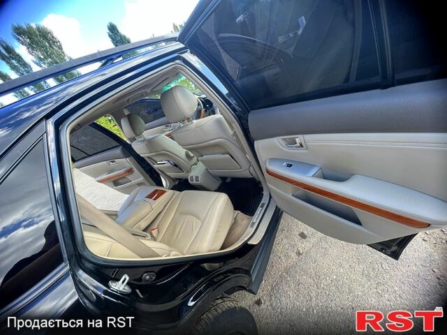 Черный Лексус РХ, объемом двигателя 3.5 л и пробегом 340 тыс. км за 11200 $, фото 10 на Automoto.ua