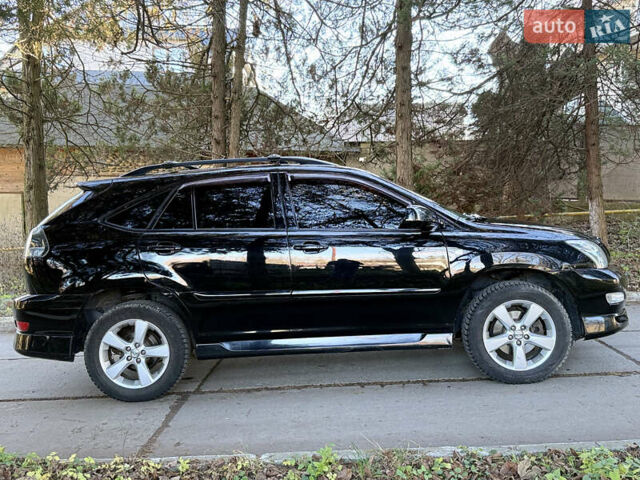 Черный Лексус РХ, объемом двигателя 3.46 л и пробегом 296 тыс. км за 8600 $, фото 3 на Automoto.ua