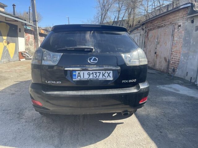 Черный Лексус РХ, объемом двигателя 3 л и пробегом 200 тыс. км за 5200 $, фото 2 на Automoto.ua