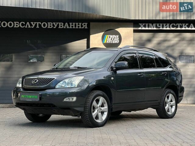 Черный Лексус РХ, объемом двигателя 3.46 л и пробегом 295 тыс. км за 8900 $, фото 1 на Automoto.ua
