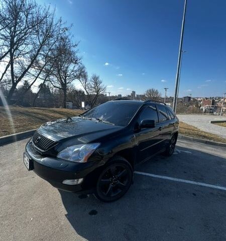 Черный Лексус РХ, объемом двигателя 3.46 л и пробегом 250 тыс. км за 11000 $, фото 1 на Automoto.ua